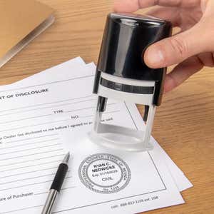 The State of Nevada Engineer Seal being used on a document