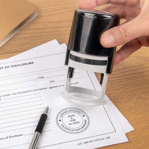 The State of New Hampshire Architect Seal being used on a document