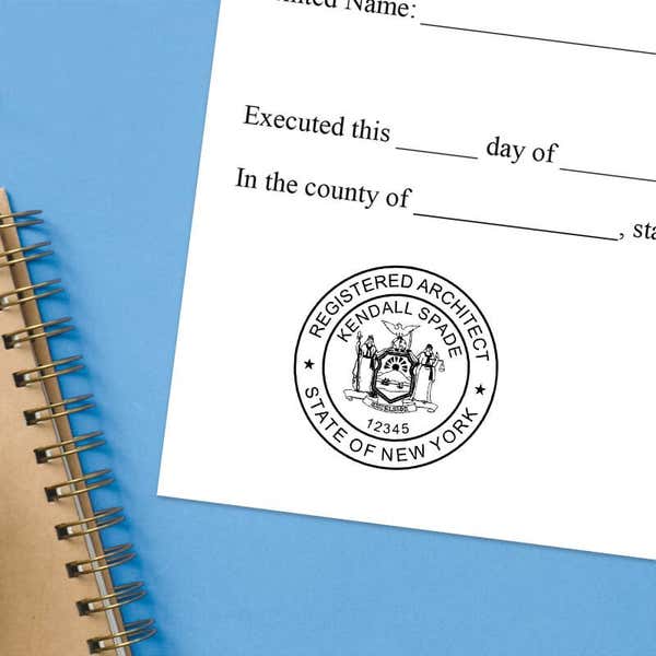 State of New York Architect stamp impression on a document with a blue background