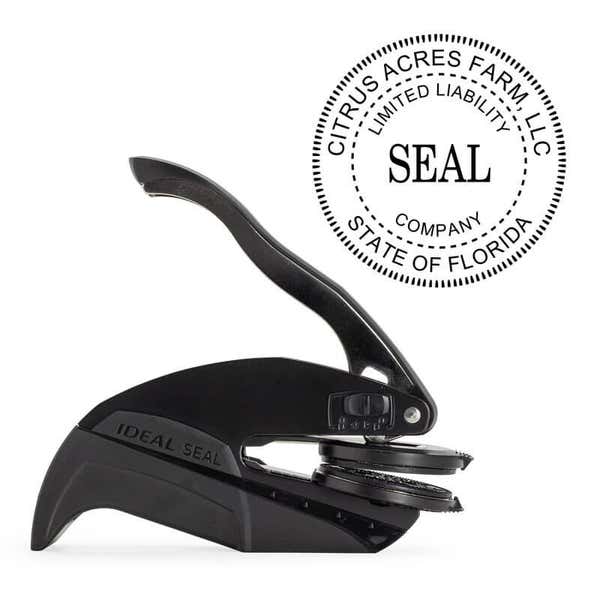 The Limited Liability Company Seal Embosser with Year is pictured with the Pocket Seal by Trodat.