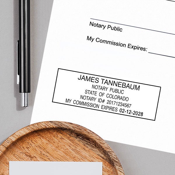 Colorado Notary Pink Stamp - Rectangle Impression on Paper