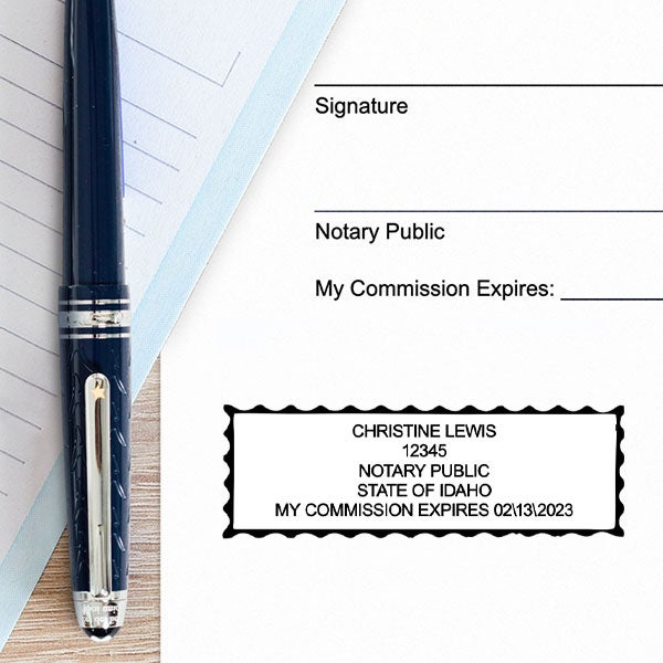 Example of impression next to pen and paper