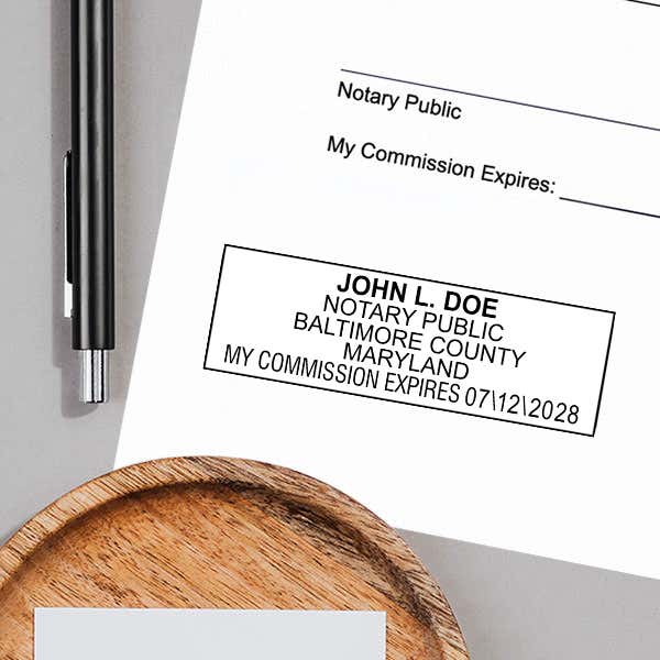 Example of Maryland Notary Pink Stamp - Rectangle impression on white paper