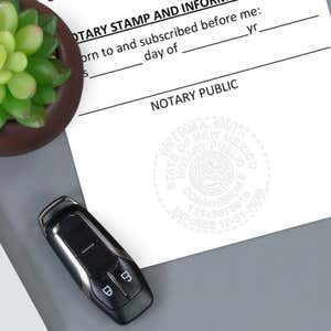 New Mexico Notary Pink Seal - Round Design Imprint Example on a Document