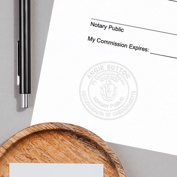 Example of Massachusetts Notary Pink Seal Embosser - Round impression on paper