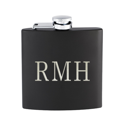 Black flask with three initials engraved in silver text