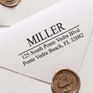 Example of Last Name Address Stamp Impression on an Envelope