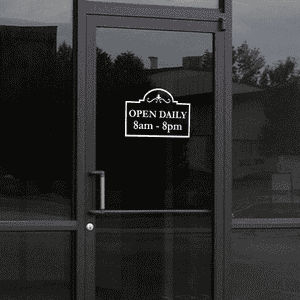 Open Daily Business Hours Die Cut Decal on a storefront window