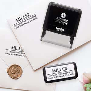 Examples of the Last Name Address Stamp on envelopes