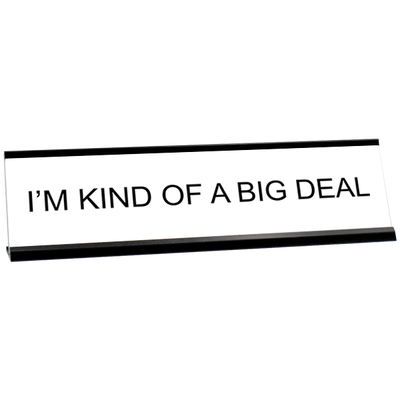 White desk plate with black custom text in a black holder