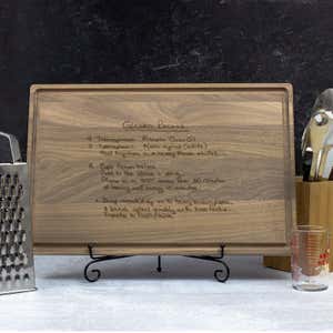 Large Custom Cutting Board on Metal Easel Displayed in a Kitchen