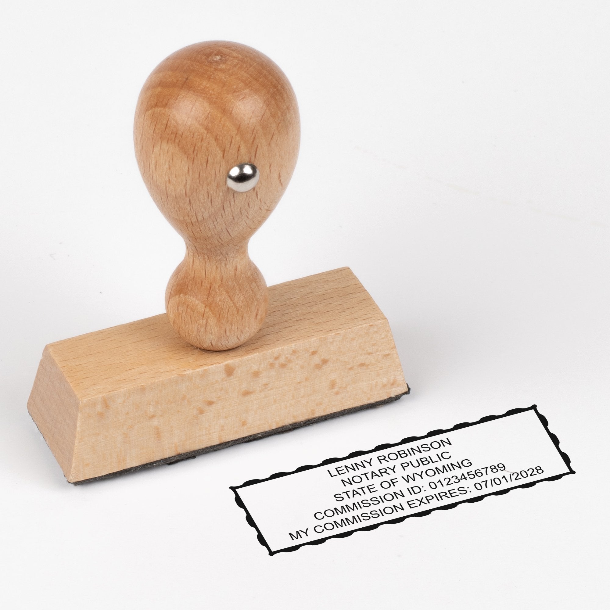 The wood-handled stamp version of the Wyoming Rectangle Notary Seal