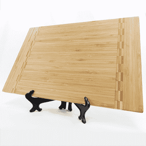Wooden cutting board with block inlay on an easel