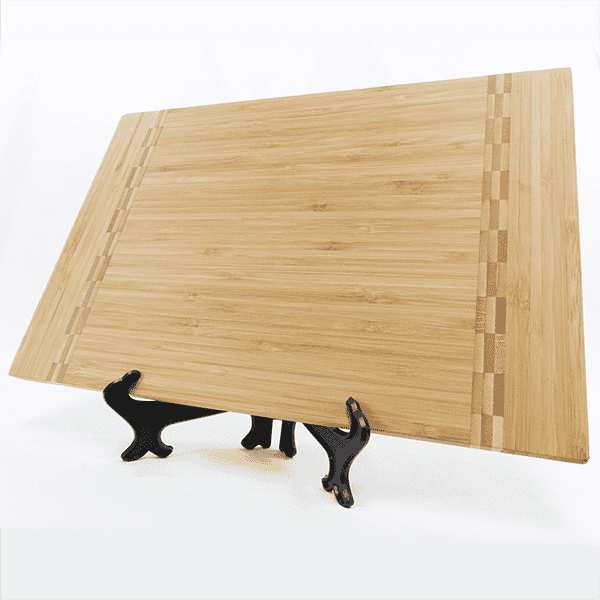Wooden cutting board with block inlay on an easel