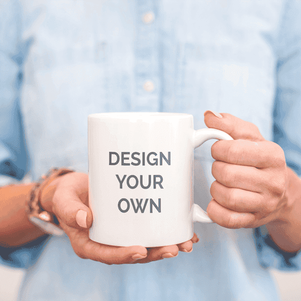 Person holding the white coffee mug