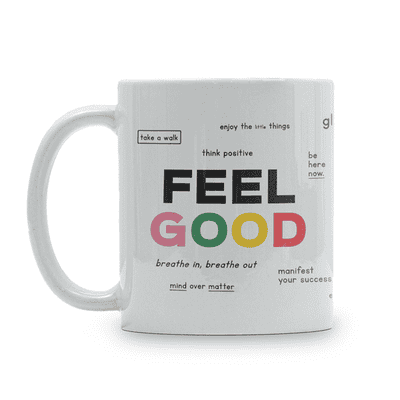 White coffee mug with various motivational messages written in black