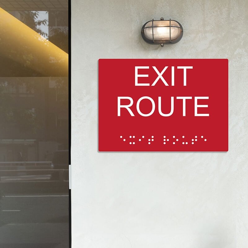 Custom ADA sign for an exit route Custom ADA sign for an exit route