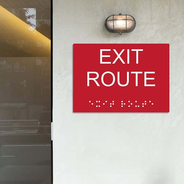 Custom ADA sign for an exit route