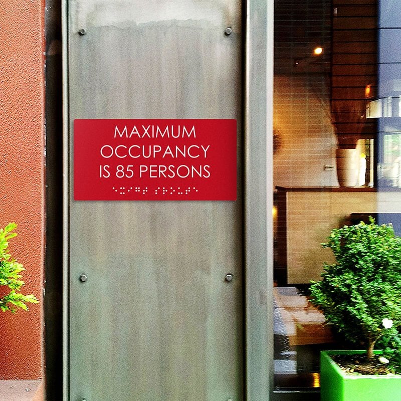Custom ADA sign for a maximum occupancy warning Custom ADA sign for a maximum occupancy warning