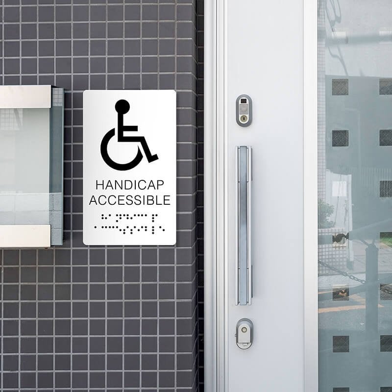 Custom ADA sign for a handicap accessible restroom Custom ADA sign for a handicap accessible restroom