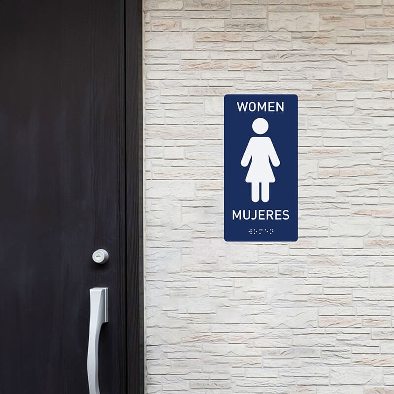 Custom ADA sign for a women's restroom with English and Spanish writing