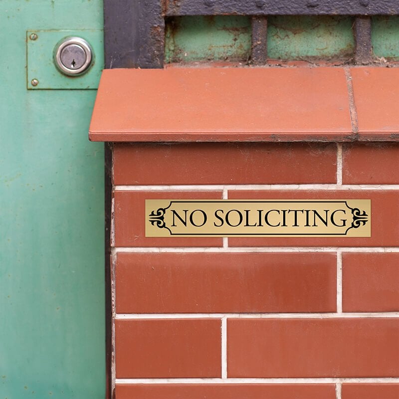 1x6 custom engraved brass sign displayed on brick 1x6 custom engraved brass sign displayed on brick