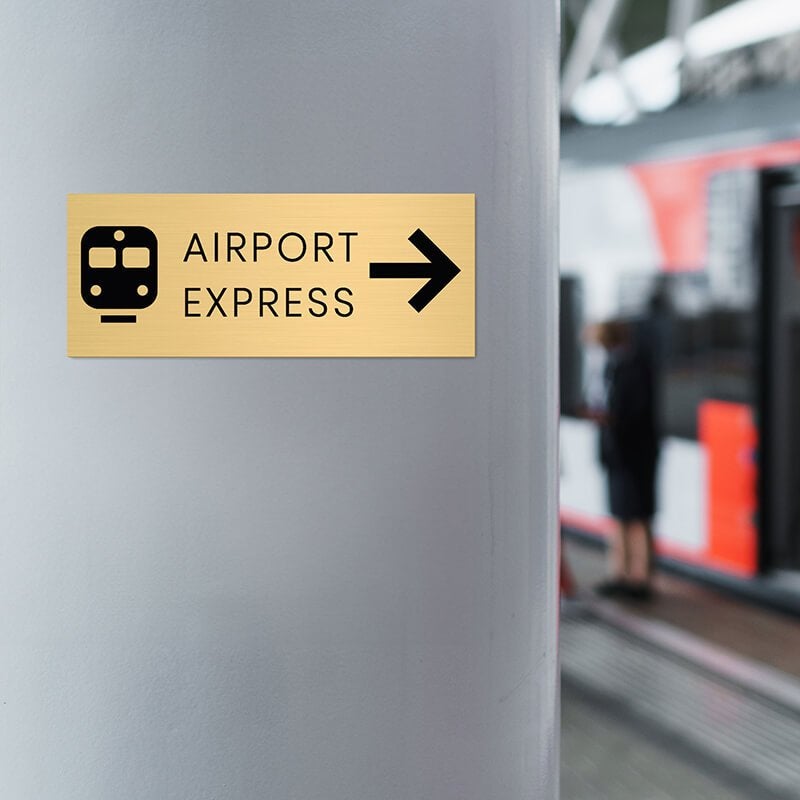 4x10 custom engraved brass sign displayed in an airport 4x10 custom engraved brass sign displayed in an airport