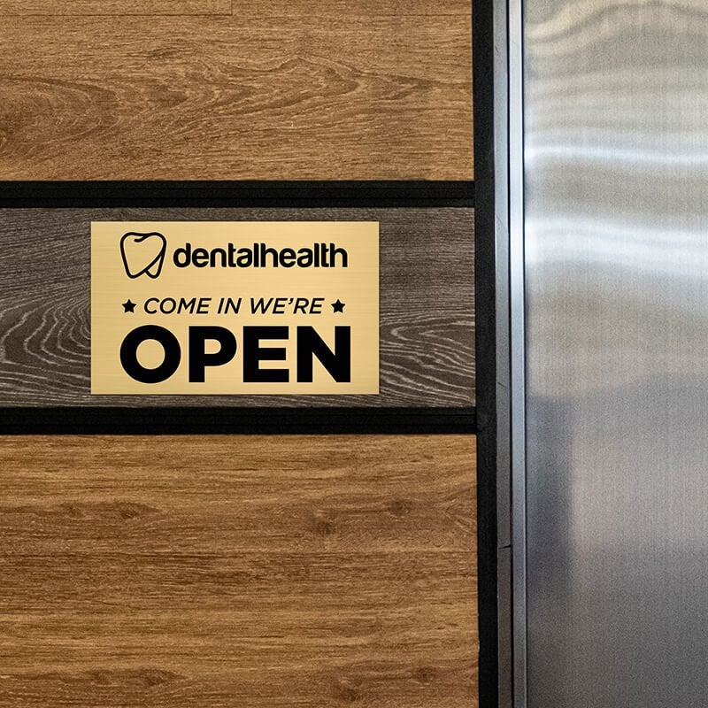 6x10 custom engraved brass sign displayed on a wall 6x10 custom engraved brass sign displayed on a wall