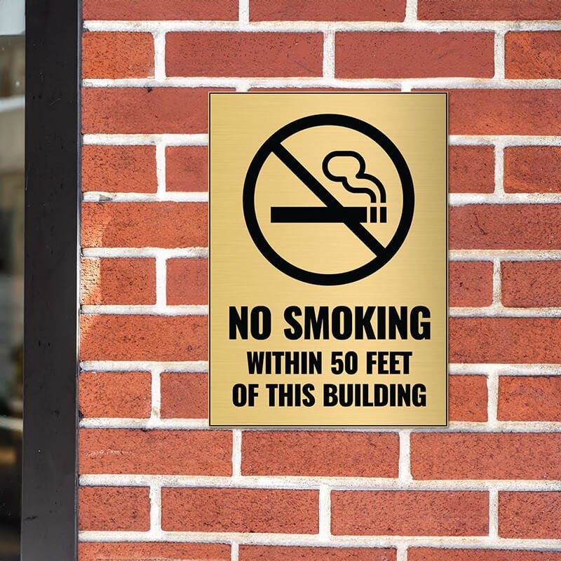 14x10 engraved brass sign on a brick wall