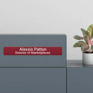 2x14 plastic sign as a name plate at a desk
