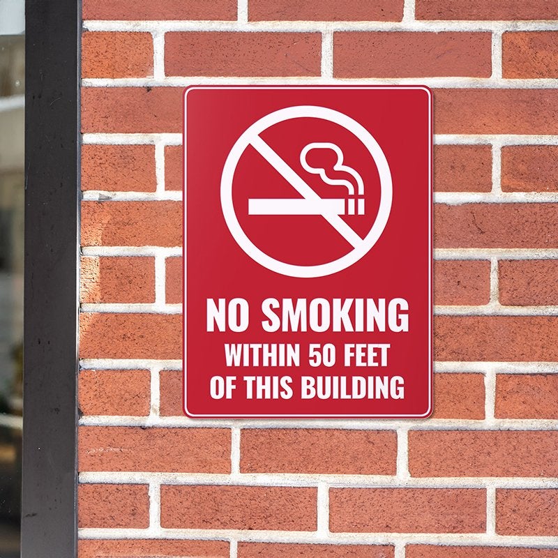 A red engraved no smoking sign A red engraved no smoking sign