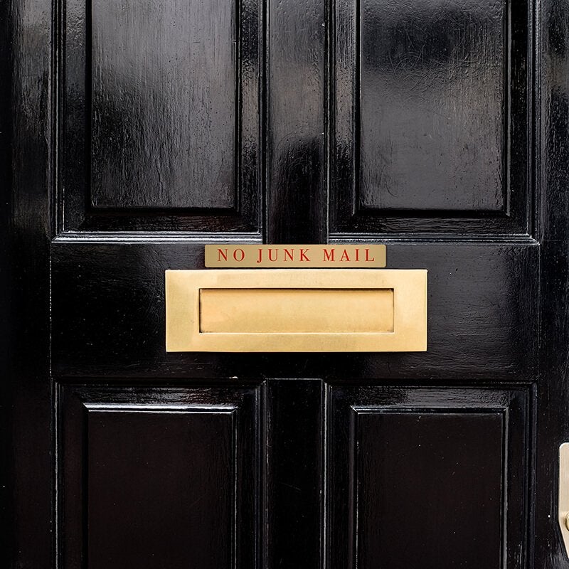 1x8 printed brass sign displayed on a door 1x8 printed brass sign displayed on a door