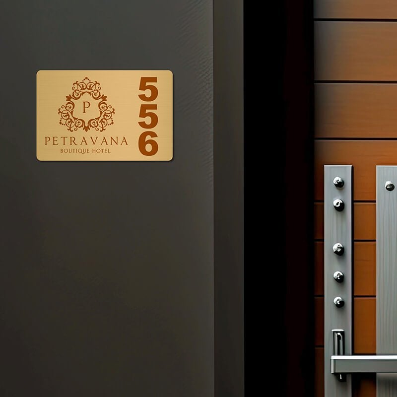 2x3 printed brass sign displayed next to a doorway 2x3 printed brass sign displayed next to a doorway