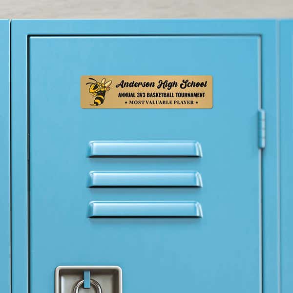 2x8 printed brass sign displayed on a locker 
