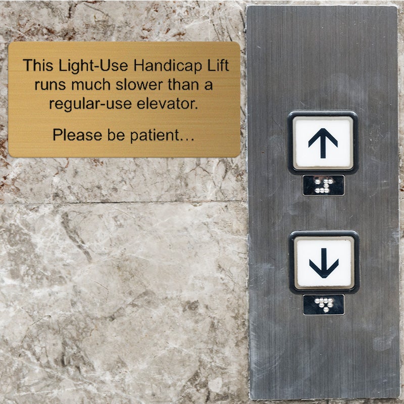 Engraved Brass Plate Giving A Notice For A Handicap Elevator Engraved Brass Plate Giving A Notice For A Handicap Elevator