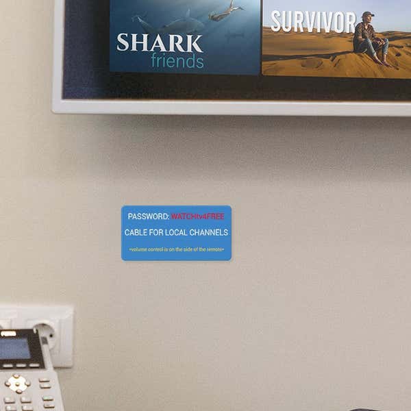 Blue Plastic Sign with Red and White Text for a Hotel Wi-Fi Password