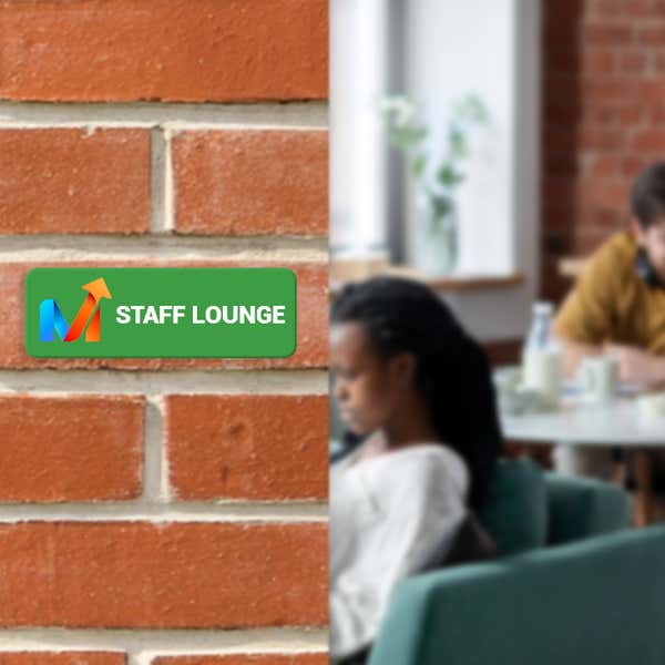 A Green Plastic Sign With a Company Logo and Says STAFF LOUNGE