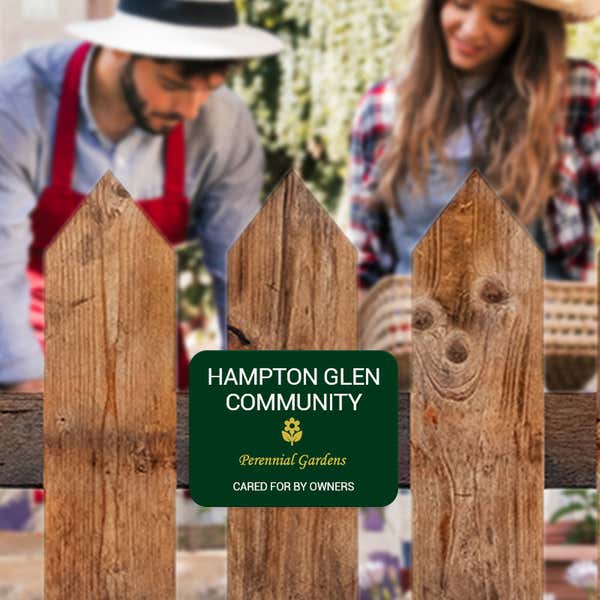 Green Plastic Sign with White and Yellow Letting for a Community Garden