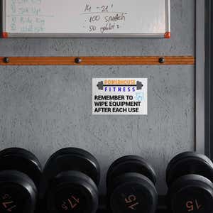 A Custom Plastic Sign for a Gym with a Colorful Logo and a Message to Gym Members