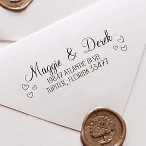 Couple Hearts Handwritten Address Stamp impression close up on white envelope