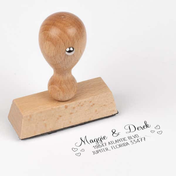 Couple Hearts Handwritten Address Stamp impression next to european stamp body