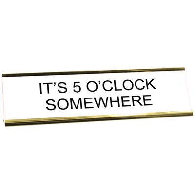 White desk plate with black custom text in a yellow gold holder