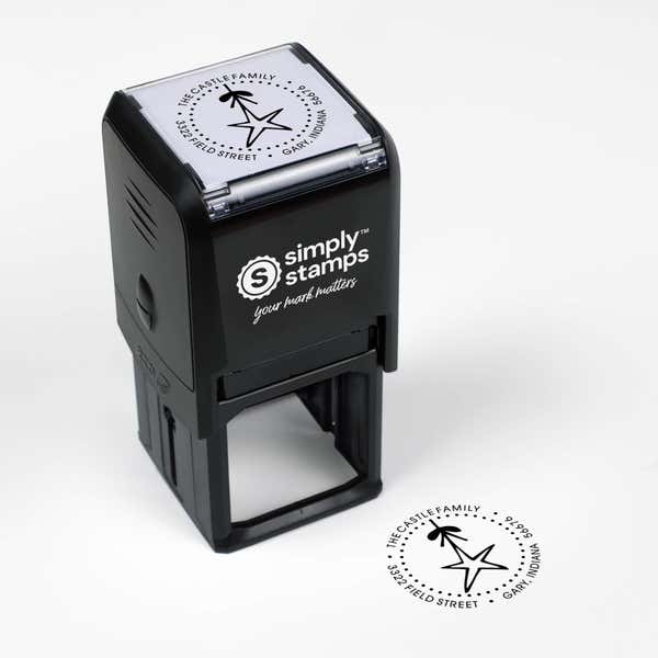 Top angle view of self-inking holiday stamp with circular ‘Holiday Star’ address design.