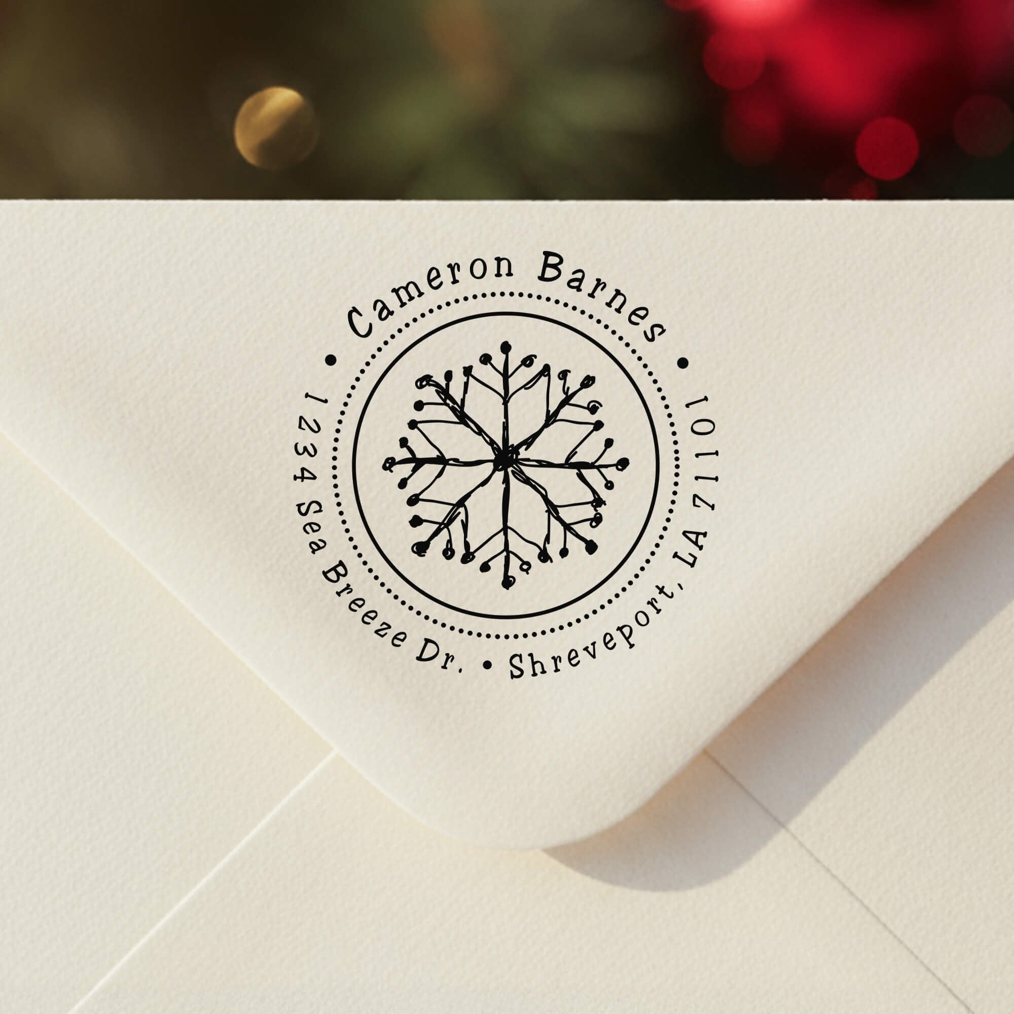 Personalized ‘Hand Drawn Snowflake’ address stamp impression on envelope flap for holiday cards.