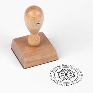 European wood hand stamp shown from above featuring custom ‘Hand Drawn Snowflake’ holiday return address design.