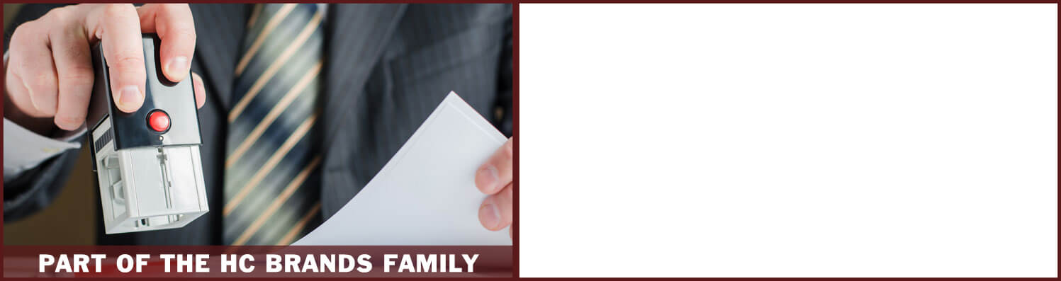 Man Using Self-Inking Stamp