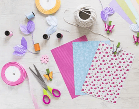 pink and purple scrapbooking supplies and envelope
