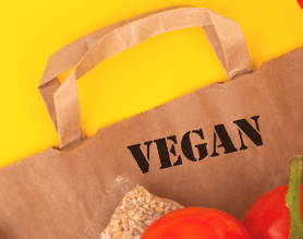 Vegan stamp on paper grocery bag