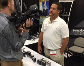 stamp expert in front of camera