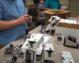 Production image of stamps being assembled